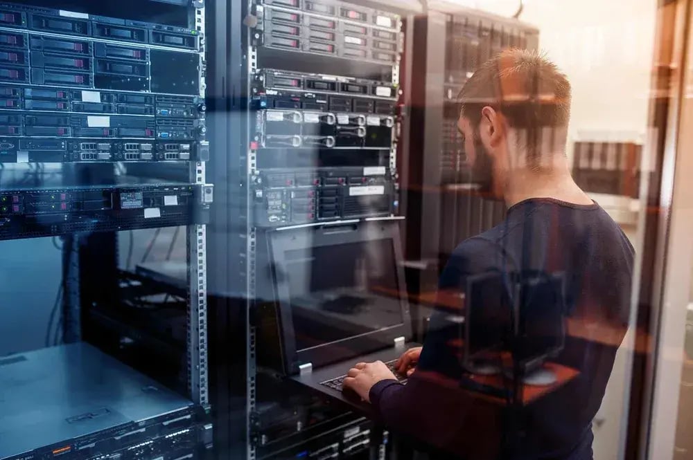 Man-Working-on-Server-scaled_converted