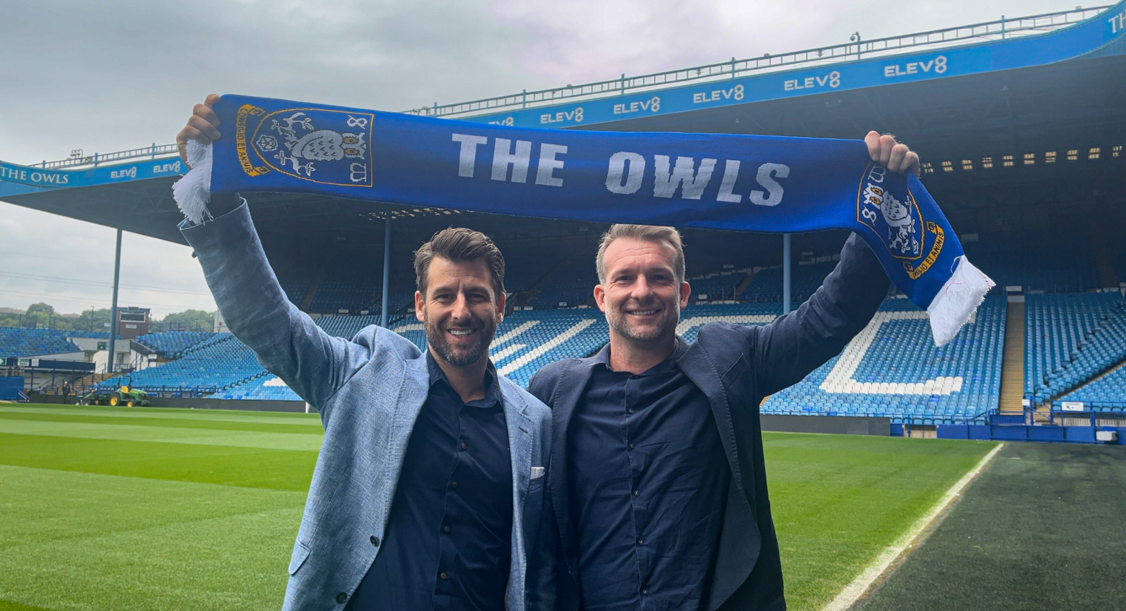 Nick & Dan holding Owls scarf at Hillsborough